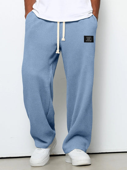 Valto - Drawstring Wide-Leg Trousers